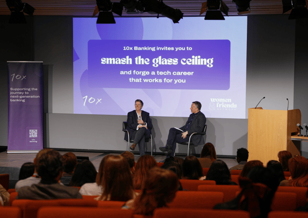 International Women's Day fireside chat with Becky Pinkard and Antony Jenkins speaking on stage